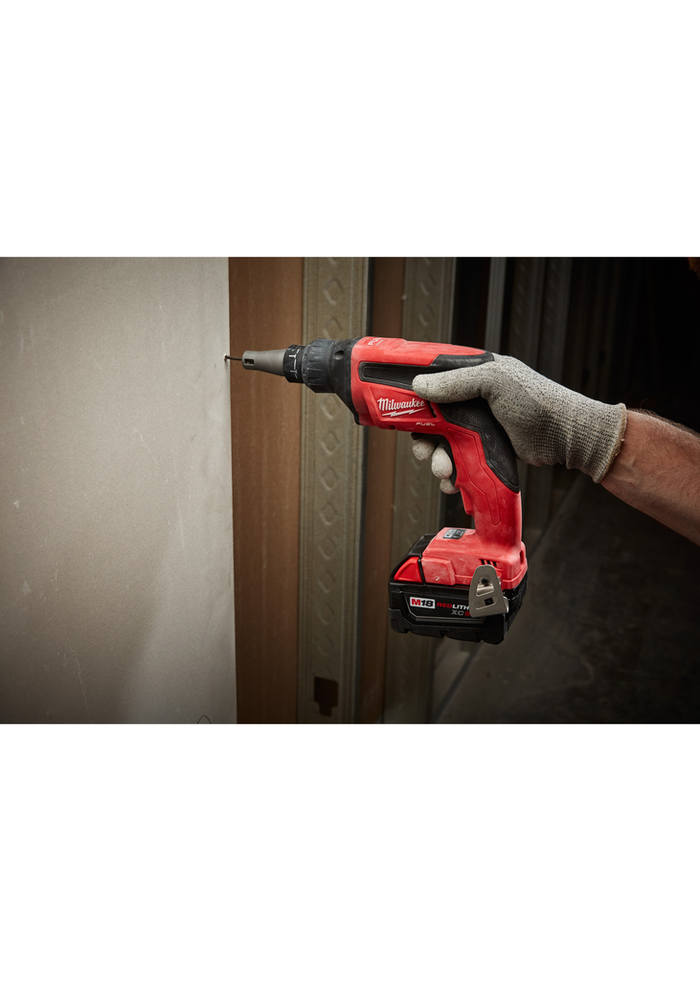 M18 FUEL drywall screw gun driving screws into metal studs