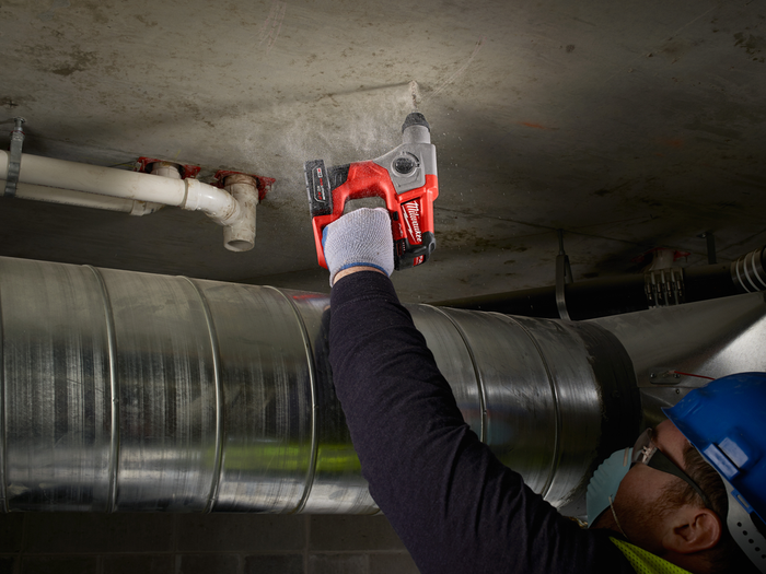 Milwaukee rotary hammer with SDS Plus chuck drilling masonry
